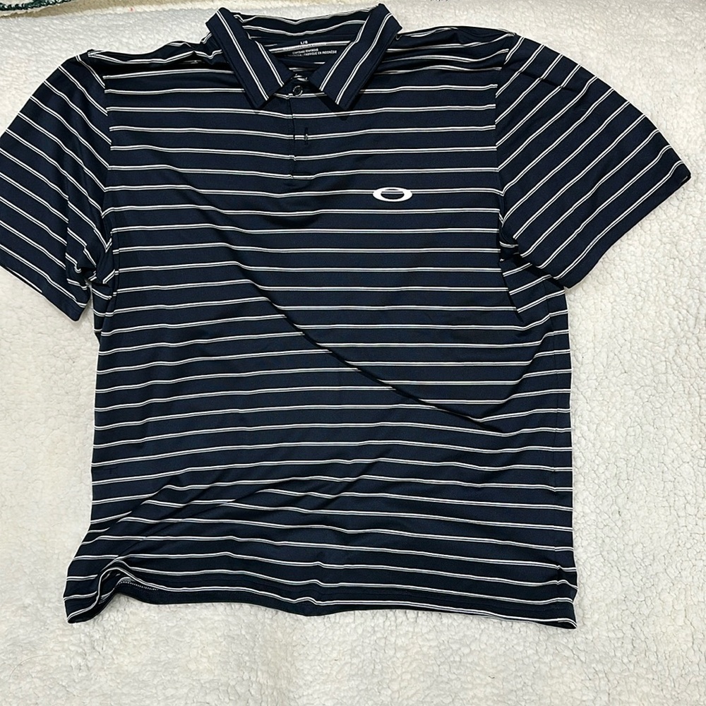 Striped Navy golf polo by Oakley